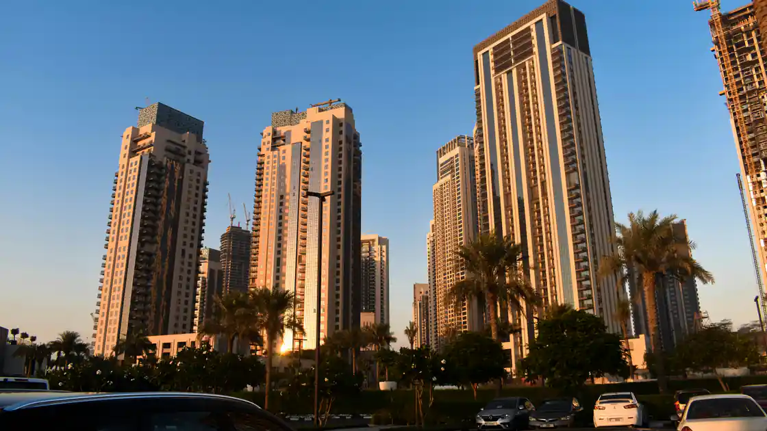 Waterfront apartment buildings and promenade at Dubai Creek Harbour