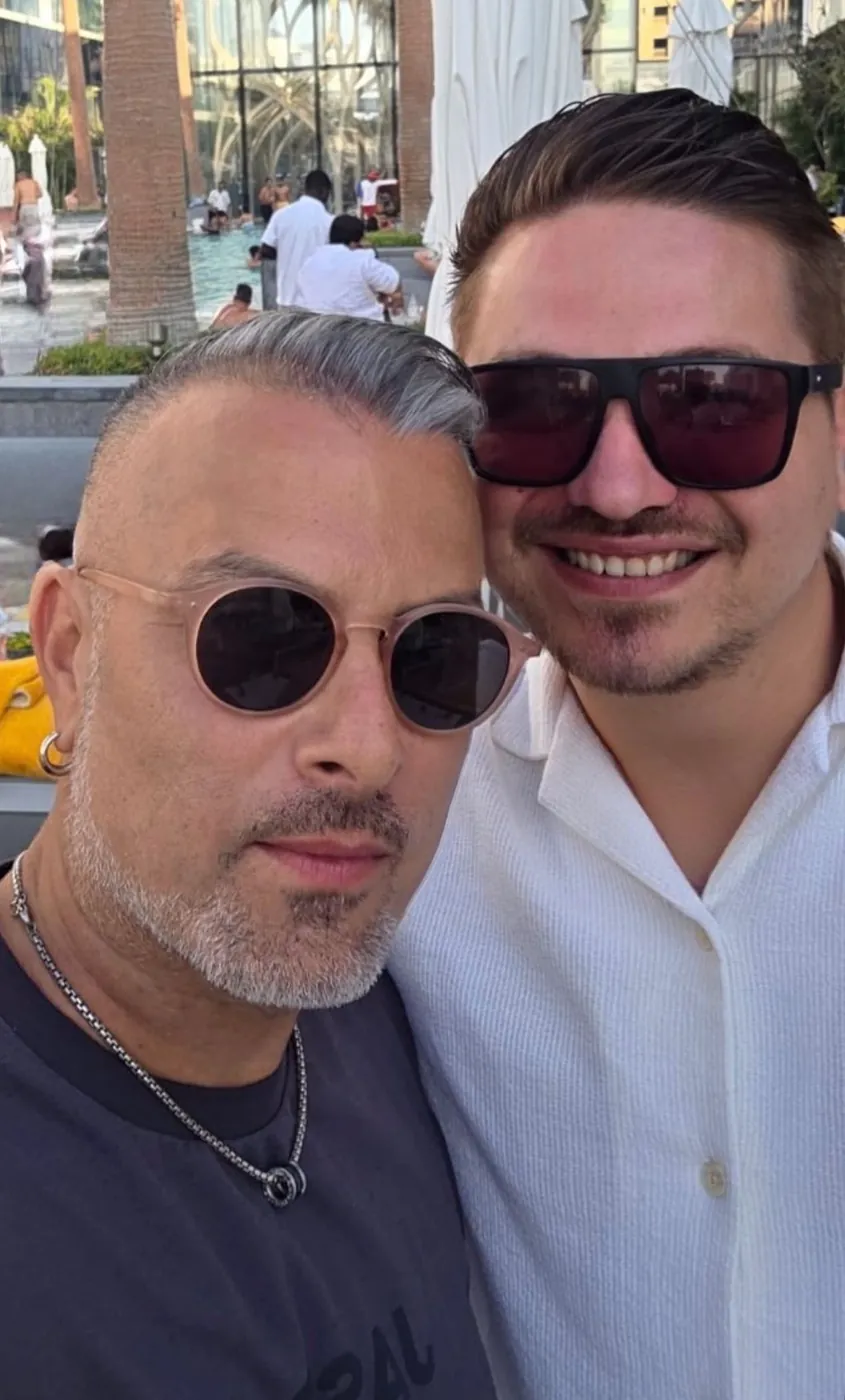 A client and a ProEstate broker at a beach club in Dubai