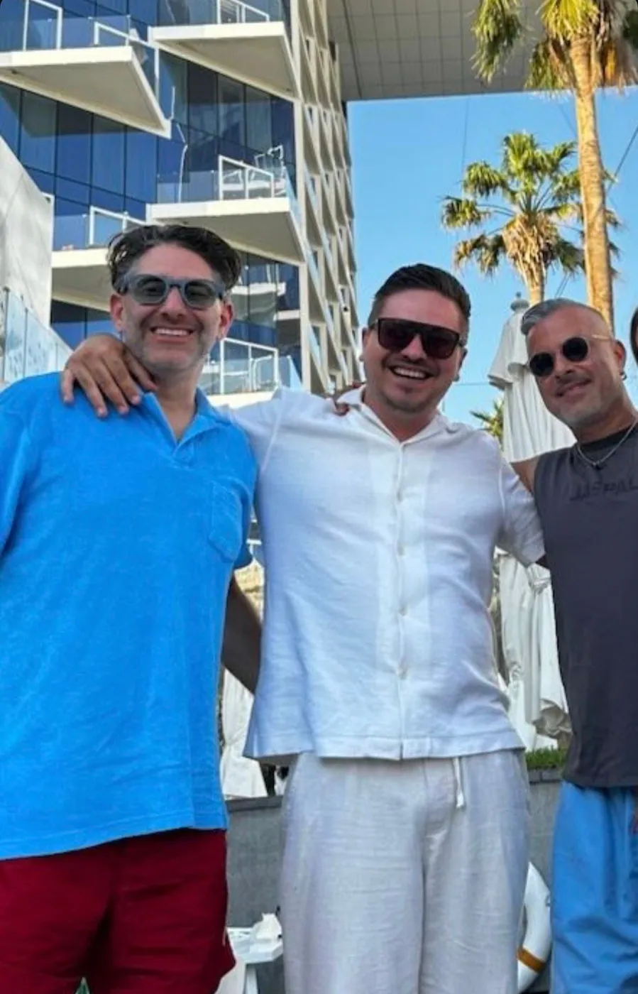 Clients and a ProEstate broker outside a residential tower in Dubai